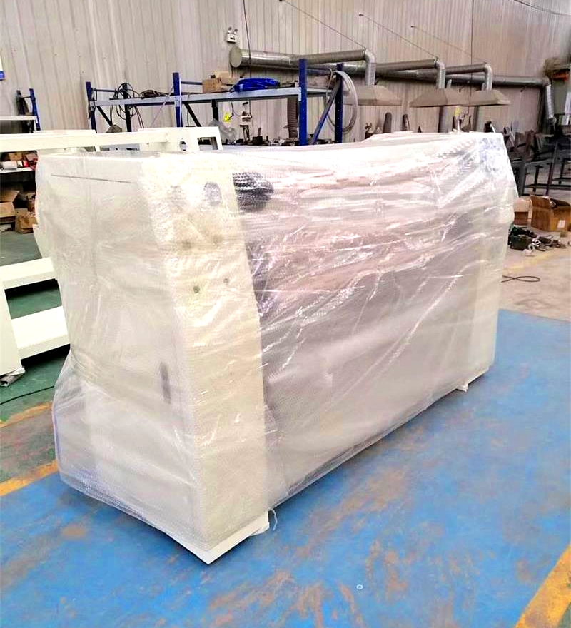 The tape slitting machine is loaded and shipped–
